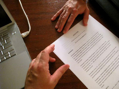 Hand_Resume_Laptop_Interviewer_Space