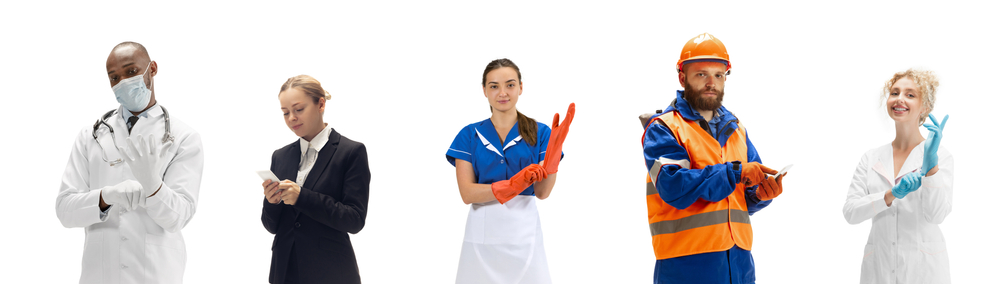 Five people in uniforms indicating a variety of careers stand side by side against a white background.