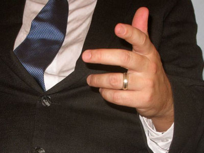 Man_Suit_Hand_Sit_Still_Interviewing